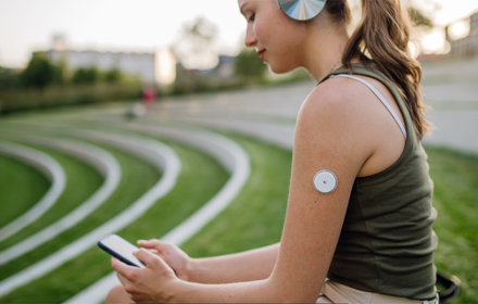 CGM Libre On Arm Sitting R